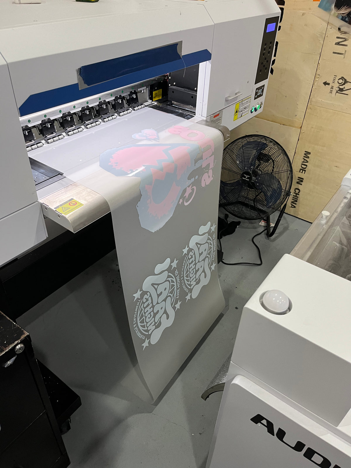 22 inch DTF gang sheet coming off the printer