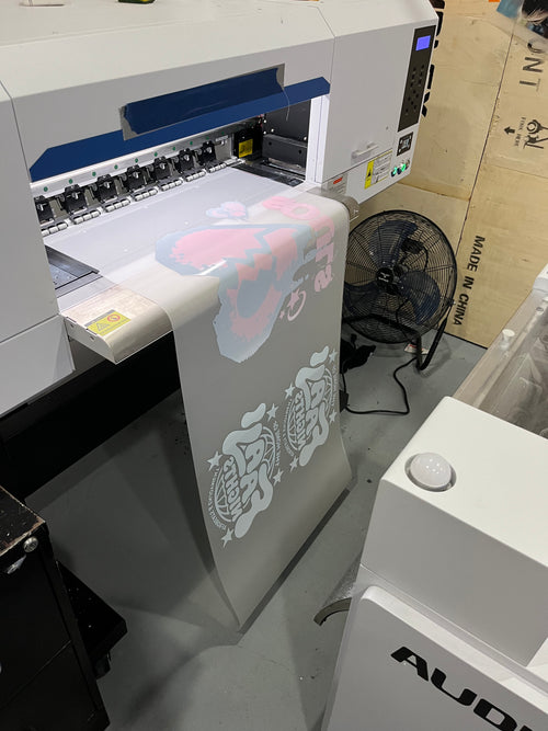 22 inch DTF gang sheet coming off the printer